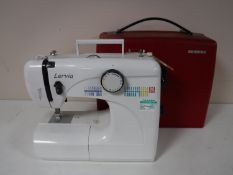A Bernina electric sewing machine,
