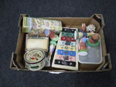 A box of xylophone, die cast model cars, nursery figures,
