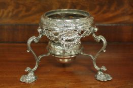 An ornate 18th century silver spirit warmer, maker W?H,