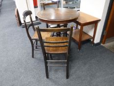 A Victorian tripod table,