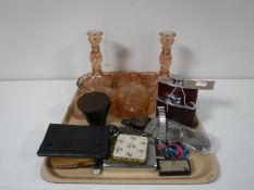 A tray of hip flasks, purses, compacts, coloured dressing table sets, stirrup cups,