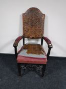 An antique carved armchair