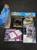 Six boxed toys including Lord of The Rings, Battle at Helms Deep, Playmobil football set,