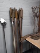 A quantity of metal garden markers decorated with birds, butterflies,