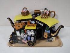 A tray of Ringtons limited edition collectors teapots CONDITION REPORT: One black