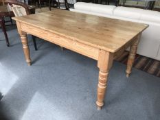 A Victorian style pine dining table