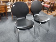 Four laminated office chairs