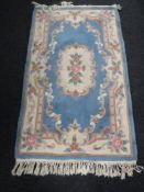 Two fringed Chinese rugs
