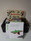 A box containing childrens games, Connect Four,