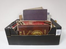 A box containing books, one volume David Lynch, King Albert book,