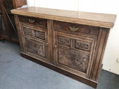 A late Victorian walnut sideboard