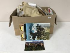 A large box containing a quantity of postcards and ephemera