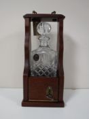 A lead crystal decanter on stand