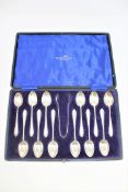 A set of twelve silver teaspoons and matching tongs, Walker & Hall, Sheffield 1927, cased.