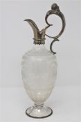 A Victorian etched glass and silver mounted ewer.