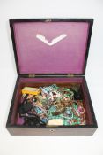 A Victorian mahogany box containing costume jewellery, French pins, coins, necklaces,