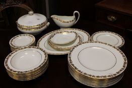Thirty nine pieces of Wedgwood Whitehall W4001 gilded dinner ware.