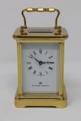 A modern brass cased Matthew Norman carriage clock, with enamel dial and platform escapement,