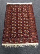 A Tekke rug, of traditional design, 155cm by 102cm.