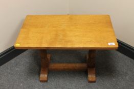An Albert 'Eagleman' Jeffray oak refectory coffee table, with carved eagle signature, width 61cm.