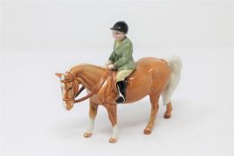 A Beswick Boy on Palomino pony 1500.