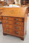 An inlaid mahogany bureau fitted four drawers, width 76cm.