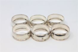A good matching set of six silver napkin rings, maker H H,