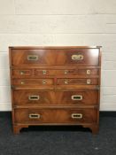 A 19th century style mahogany military style multi drawer chest, with brass carry handles,