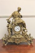 A gilt metal 8 day figural mantel clock with enamel dial, height 55cm.
