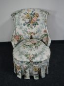 Two 19th century style floral covered salon chairs with shaped backs.
