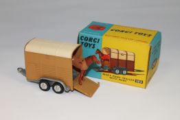 A Corgi Toys die cast vehicle - Rice's Pony Trailer with Pony, 102, boxed.
