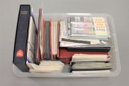 A large collection of stamps, First Day covers, early 20th century stamp albums.