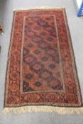A Balouch rug, late 19th/early 20th century, 175cm by 95cm.