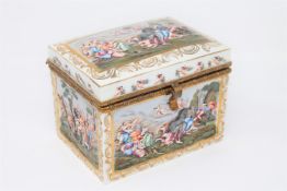 A continental porcelain lidded table casket, painted with scenes of classical figures revelling,