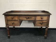 An early Victorian mahogany writing desk, fitted five drawers,