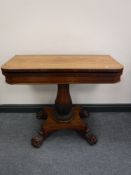 A William IV rosewood foldover top tea table,