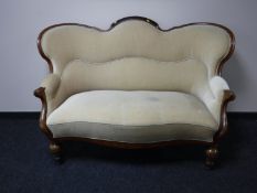 A 19th century walnut framed shaped back two seater settee, width 152cm.
