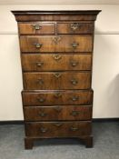 A George II walnut chest on chest, fitted with eight drawers, raised on bracket feet, width 98 cm.