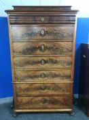 A 19th century mahogany seven drawer chest on scroll feet, width 100cm.