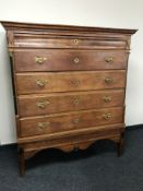 A 19th century oak chest of five drawers, on stand, width 130cm.