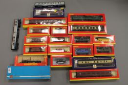 A collection of Hornby and other rolling stock, carriages etc.