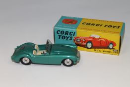 A Corgi Toys die cast vehicle - M.G.A. Sports car, 302, boxed.