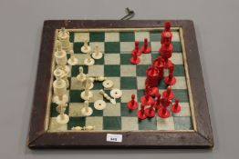 A 19th century stained ivory chess set, (part),