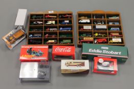 Two wooden display cases containing die-cast model vehicles together with further die-cast,