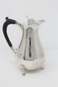 A silver hot water jug, Henry Wigfull, Sheffield 1910, of baluster form, height 18cm,