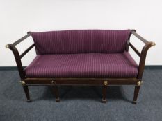 An Empire style mahogany ormolu mounted three seater settee, width 156cm.
