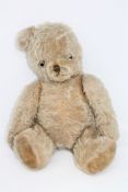 A vintage jointed mohair teddy bear with growler, height 50cm.