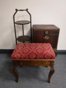 A mahogany cake stand, together with a bedside cabinet and an upholstered piano stool.