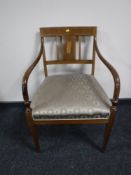 A 19th century inlaid mahogany armchair, width 55cm.