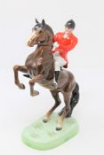 A Beswick Huntsman on rearing horse 868, style 1 second version, brown.